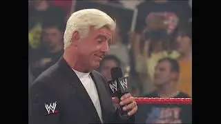 Eric Bischoff awards Triple H with the World Heavyweight Championship 2002