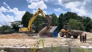 Cutting and screening fill material. Kobelco 290 excavator and Volvo L70G Loader