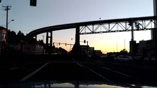 Driving through Astoria in the evening