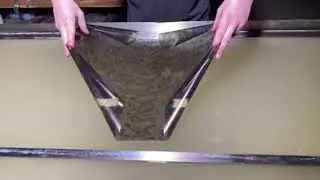 Placing Hydro Dip Film on Water