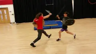 Sword and shield fight Dilyana Bouklieva and Ed Gamester