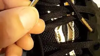 Black metallic gold foamposite