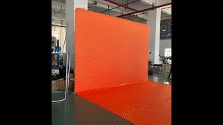 Photo booth custom print fabric backdrop with floor for photographing.