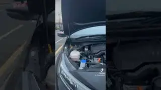 Where to top up your screen wash in a Hyundai i20 2023