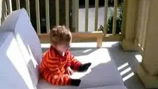 Liam Playing On Balcony
