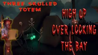 Three skulled totem high up over looking the bay, Krakens Fall