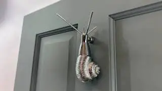 Bright Chrome Snail Door Knocker