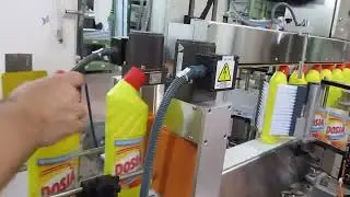 Labelling: Flat bottles front & side labeling machine for oval containers By Tadbik.