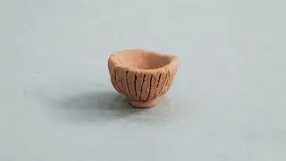 CLAY RECORDS - A rice bowl the size of a coin. NOT CERAMIC.
