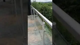 Stainless steel posts and handrail with glass infill panels