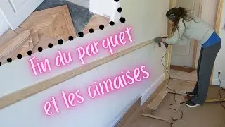 Finir la pose d'un parquet et les moulures murales cimaises dans la chambre