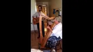 Live healing music at the bedside for patient in the hospital - harp and guitar.