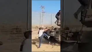 Gunfire heard as tank burns after Hamas attack