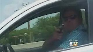 Driver Records Driver Pointing Gun At Her On Road