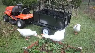 Husqvarna LT130 Lawn Tractor with trailer.