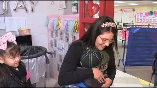 Irving Elementary teachers greet students with hugs and high-fives