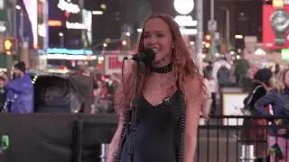 Zoë Buckman, Dave Guy, and Homer Steinweiss Perform in Times Square
