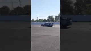 Indianapolis 500 Gordon Pipers escorting the Borg Warner to Victory Circle.    August 23, 2021