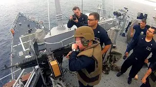 Navy Captain and Sailors Shoot Ship's Machine Guns