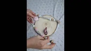 How to attach a pacifier clip and a MAM adapter