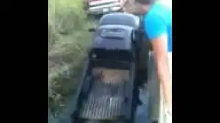 Tim's Dakota in a creek vs. Chris' F250