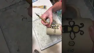 Carving a honey bee mug