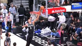Victor Wembanyama fully stretches his arm to block Brunson's shot before it reached the backboard
