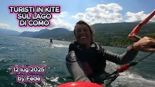 Turisti sul lago di Como in kite