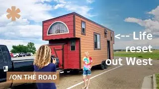 Woman tows off-grid, wood-clad tiny home to restart life