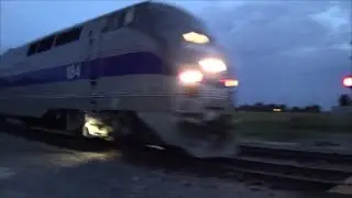 BNSF Freight with Damaged Hopper Meets Heritage-led California Zephyr at Dusk