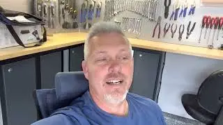 Compact high back camp chair from Costco by Cascade Mountain Tech.  I can take it on my motorcycle