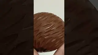 Freshly carved pottery garden orb