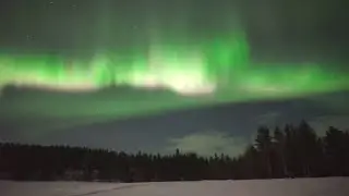 Northern Lights Take Over Finland Night Sky