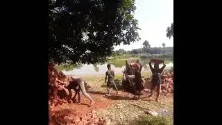 Bricks broken machine work in Bangladesh people
