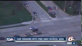 SUV crashes into Pike High School sign
