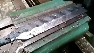 Old machine making damascus steel
