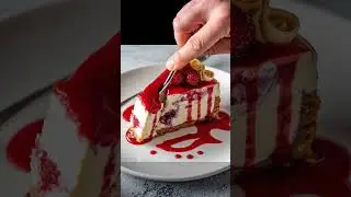 🍰✨ Raspberry Swirl Cheesecake with White Chocolate Garnish ✨🍰