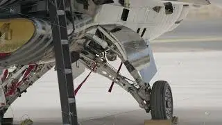 Nose landing gear extended close-up view