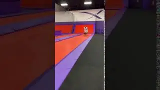 Guy does flips on trampoline, and lands and looks like he broke his legs.