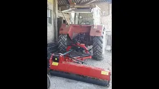 IH845 tractor and AGL185 field fence side hydraulic mower trimmer thingy