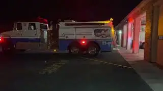 East Freedom Volunteer fire department responding to a dwelling fire