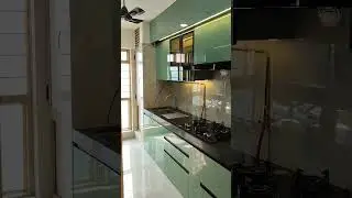 sage green acrylic modular kitchen design