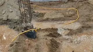soil consolidation with water in site,,, consolidation process near columns area.