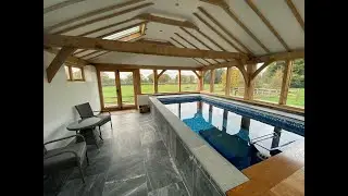 Malpelo Pools Case Study - indoor Endless Pool in oak framed pool room
