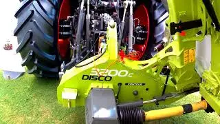 Claas Axion 800 Tractor With  Disco Contour 3200fc Profil Mower Conditioner