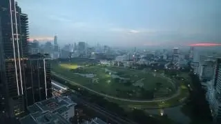 Sunset Time Lapse Looking Over Lumphini Park in Bangkok
