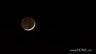 Time lapse of new crescent moon setting over the Irish Sea