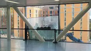 Window glass panel replacement office building.