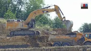 CATERPILLAR 352F Loads VOLVO A40F, Quarry / Steinbruch, Germany, 2018.