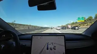 Tesla FSD 11.4.4 follows motorcyclist with a deathwish